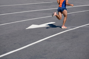 Athlete running in the city wrong way