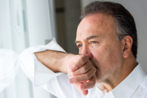 Serious concerned caucasian mature man posing looking away